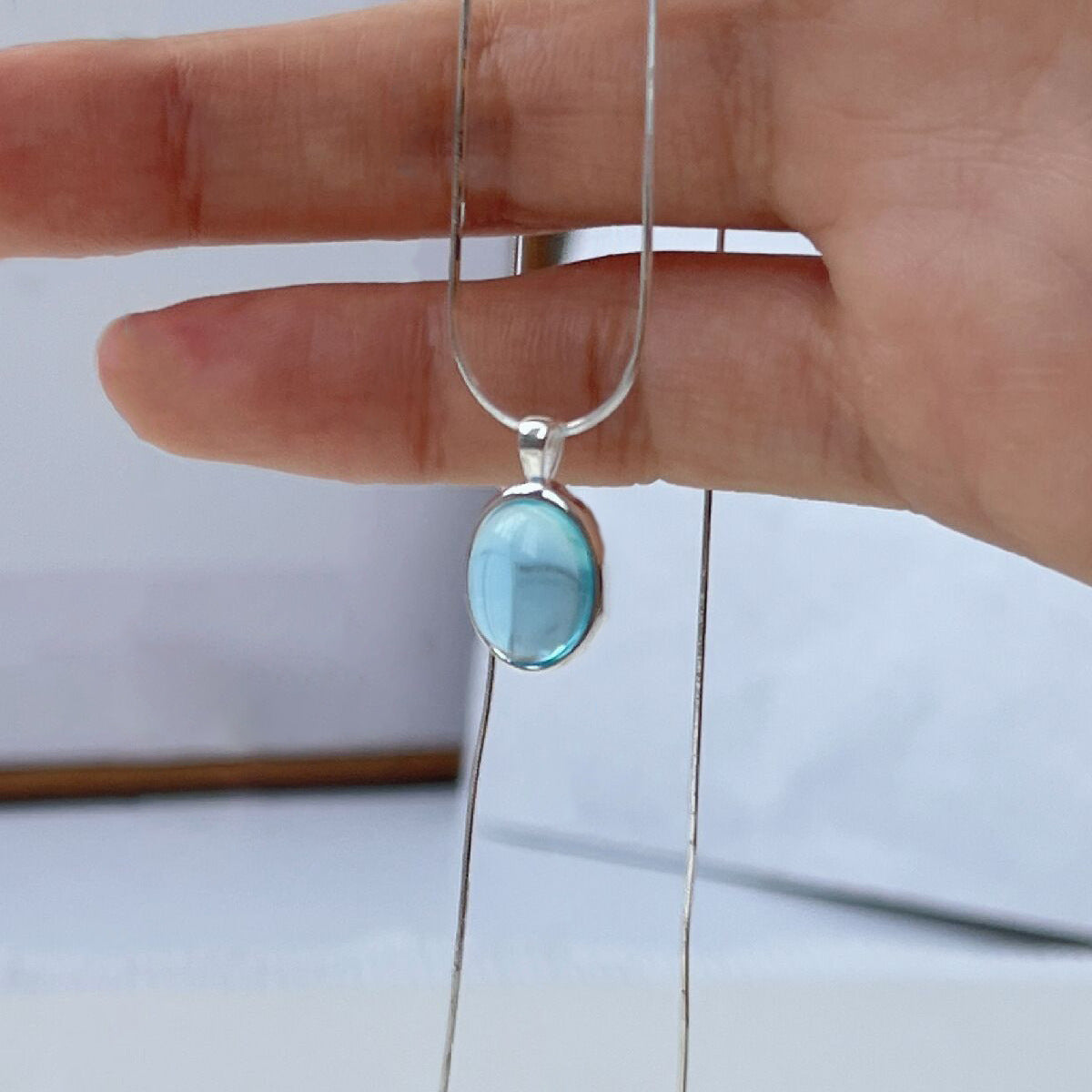 Aquamarine moonstone necklace female ins fashion light luxury niche high-end design sense oval pendant snake bone chain female